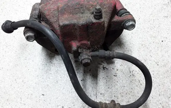 Nissan Almera N16 Front brake caliper