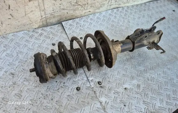 Front shock absorber with coil spring