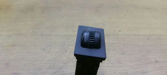 Headlight level height control switch