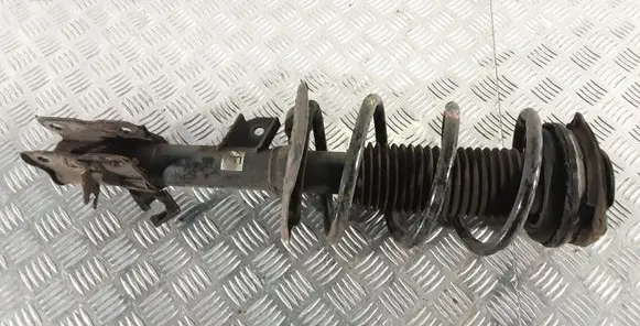 Nissan X-Trail T31 Front shock absorber with coil spring