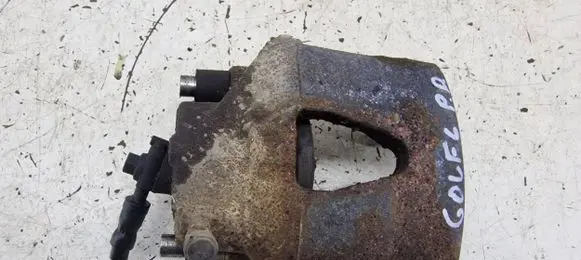 Volkswagen Golf VI Front brake caliper