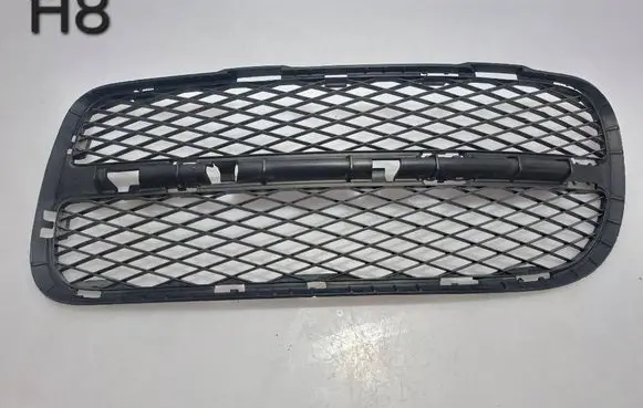Volkswagen Touareg I Front bumper lower grill 7L6853665A