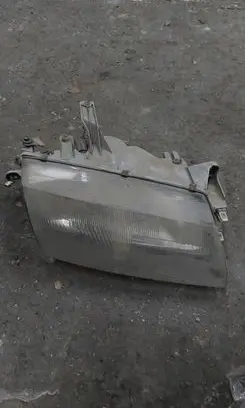 Mazda 323 Headlight/headlamp 1305235337