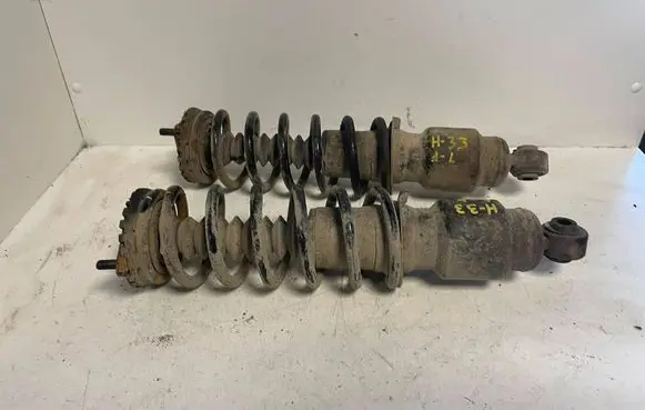 Subaru Legacy Rear shock absorber with coil spring