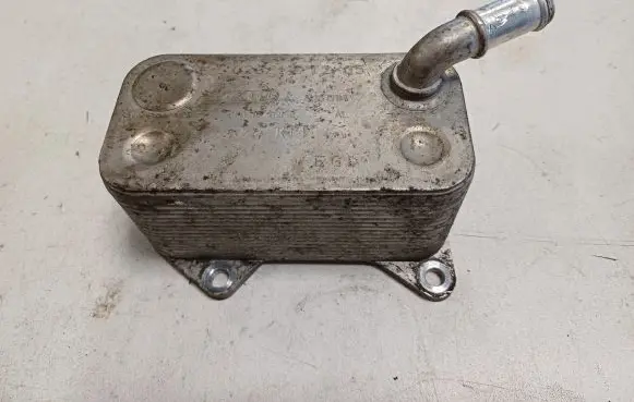 Audi A6 S6 C6 4F Engine oil radiator 06D117021C