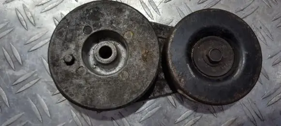Generator/alternator belt tensioner