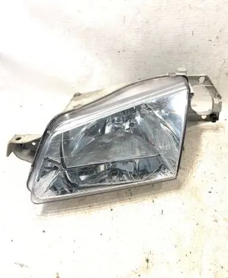 Mazda 323 Headlight/headlamp 205572B 0152110