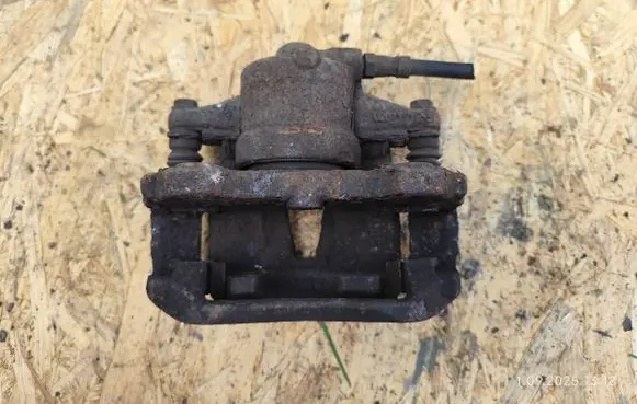 Opel Corsa D Front brake caliper 