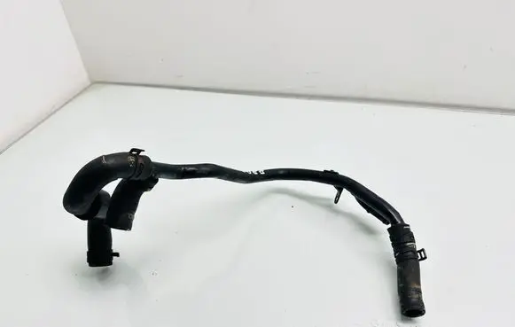 Volkswagen Touran III Engine coolant pipe/hose 04L121064AQ
