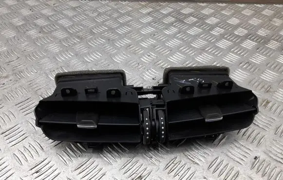 Cadillac CTS Dash center air vent grill 23171376