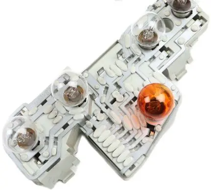 Tail light bulb cover holder