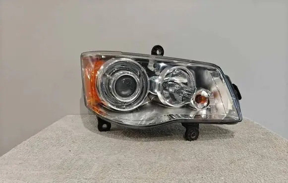 Chrysler Voyager Headlight/headlamp 05113338AE 51128C
