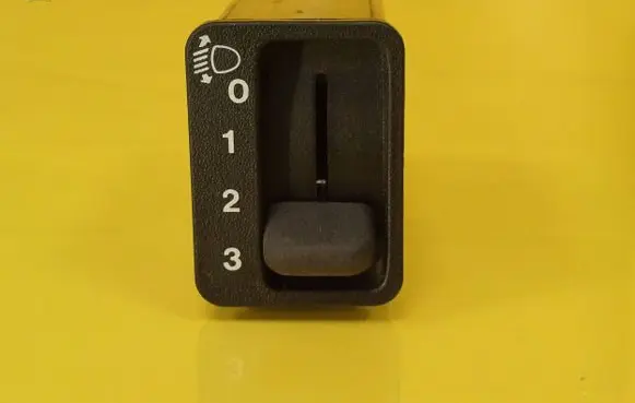 Headlight level height control switch