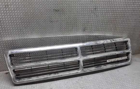 Chrysler Voyager Front bumper upper radiator grill 5263528
