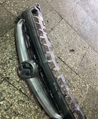 Opel Astra J Front bumper upper radiator grill 13368851