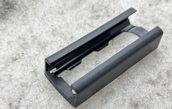 Tesla Model Y Front driver seat rail trim 156657300A