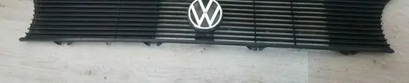Volkswagen Golf I Front bumper upper radiator grill 171853653D 321853601