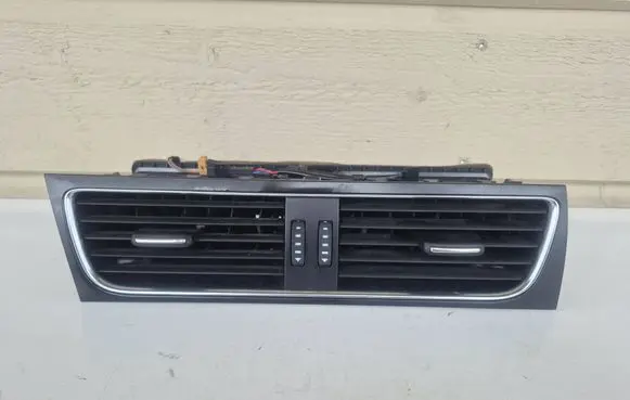 Dash center air vent grill