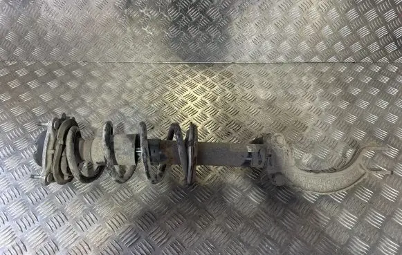 Front shock absorber with coil spring