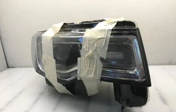 Jeep Grand Cherokee Headlight part T77621B 337223 68266664AG