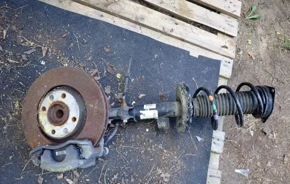 Opel Corsa F Front wheel hub spindle knuckle 9837414780