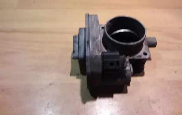 Volkswagen Golf IV Throttle valve 038128063A