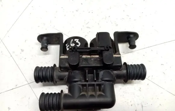 Coolant heater control valve