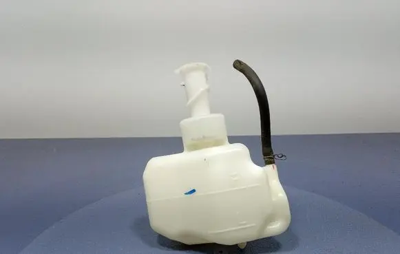 Coolant expansion tank/reservoir