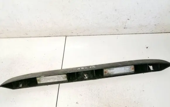 Trunk door license plate light bar