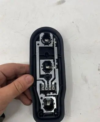 Tail light bulb cover holder