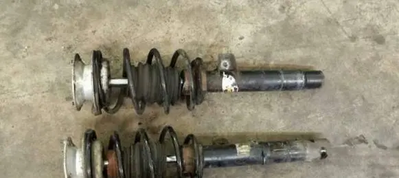 BMW 1 E81 E87 Front shock absorber with coil spring 31316771554