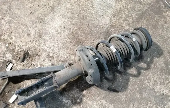 Opel Zafira C Front shock absorber with coil spring 13368504