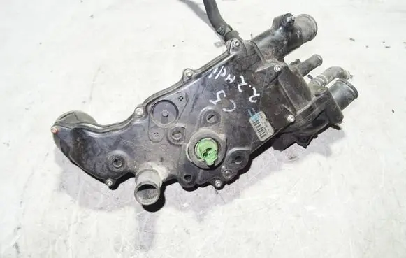 Thermostat/thermostat housing