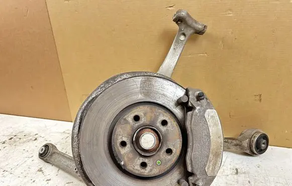 Front wheel hub spindle knuckle