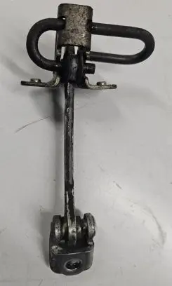 Rear door check strap stopper