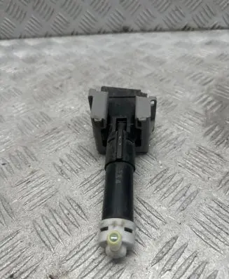 Headlight washer spray nozzle