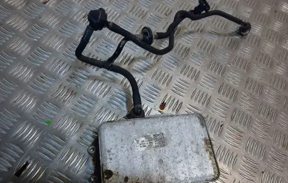 Audi A5 Engine oil radiator 06M117015M