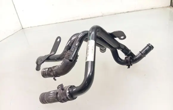 Volkswagen Golf VII Engine coolant pipe/hose 04L121051