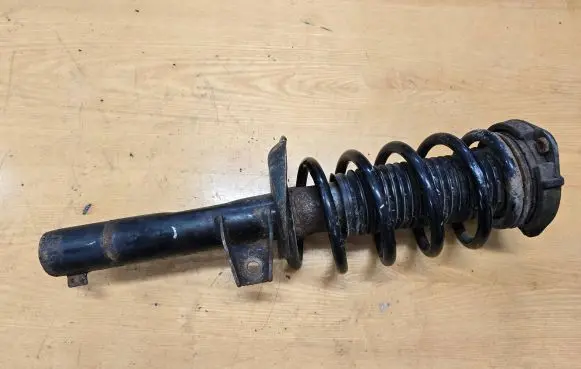 Volkswagen Caddy Front shock absorber with coil spring