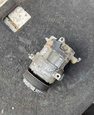 Opel Corsa D Air conditioning (A/C) compressor (pump) 55703721 GE4471905551