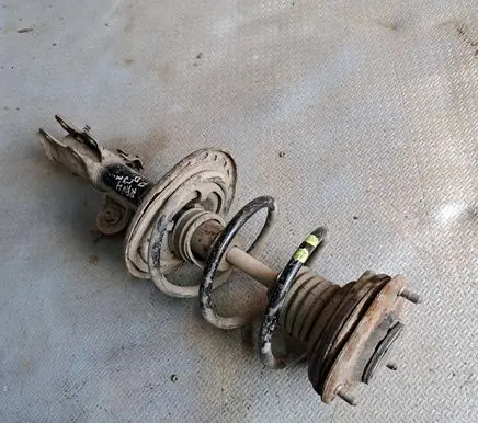 Toyota RAV 4 (XA30) Front shock absorber with coil spring 2A20489A