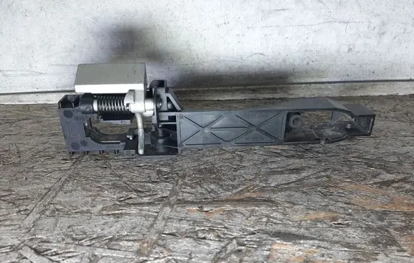Rear door exterior handle/bracket