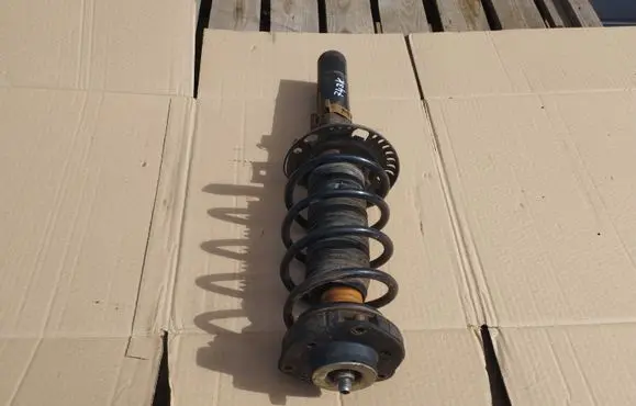 Volkswagen Fox Front shock absorber with coil spring 5Z0413031AD