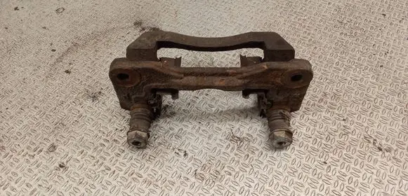Subaru Legacy Brake caliper pad carrier rear 