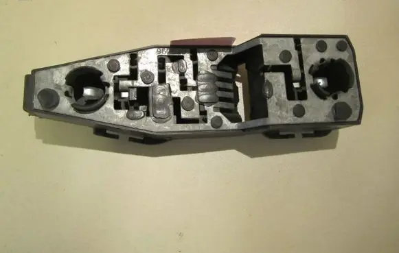 Tail light bulb cover holder