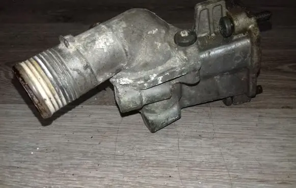 Thermostat/thermostat housing