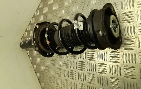 Audi A1 Front shock absorber with coil spring 2Q0413031BD