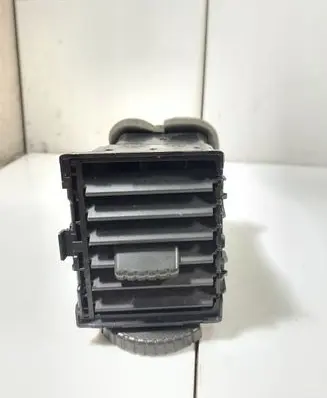 Nissan X-Trail T30 Dash center air vent grill 68750EQ000