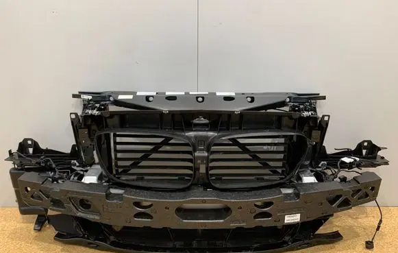 Radiator support slam panel