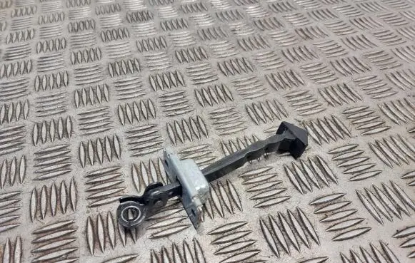 Mazda 3 II Rear door check strap stopper